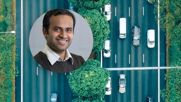 Image of Amit Chaulwar with a multi-lane road in the background.