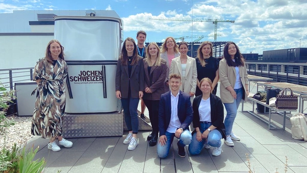 A group of students on the roof of the Jochen Schweizer headquarters