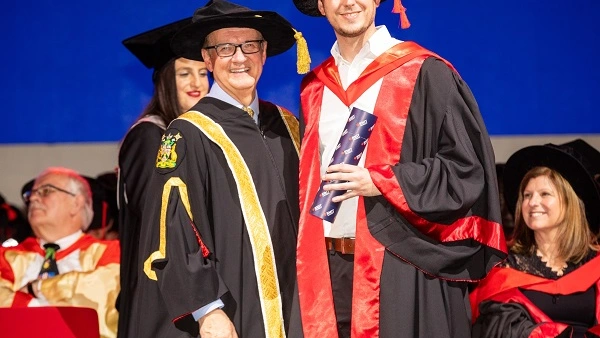 Presentation of the doctoral certificate to Dr. Michael Roth at RMIT in Melbourne