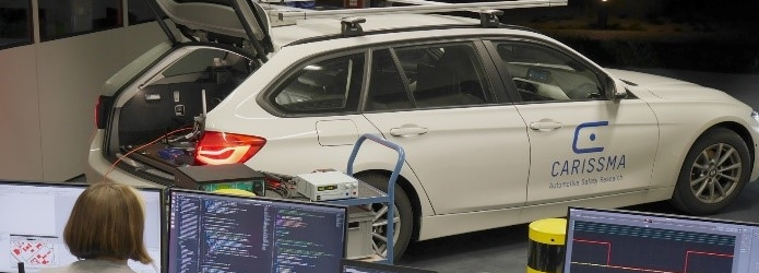 Abbildung eines Testaufbaus: Kopplung Car2X-Simulation mit Testfahrzeug zur Zuverlässigkeitsbewertung