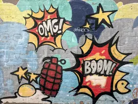Wand mit Graffiti - OMG - BOOM